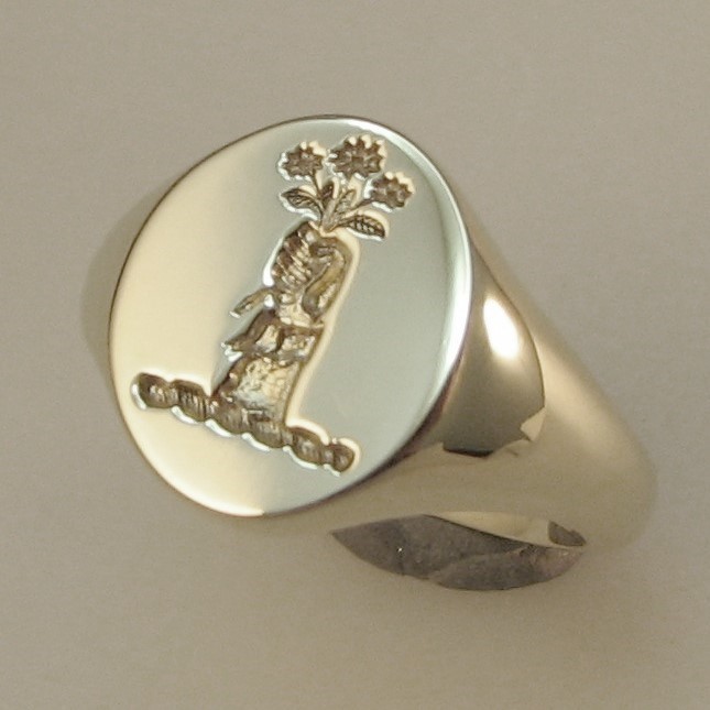 hand holding flowers crest ring silver trade