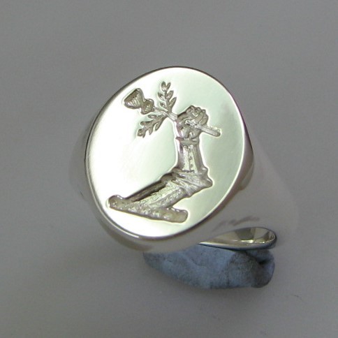 armoured arm and thistle crest ring